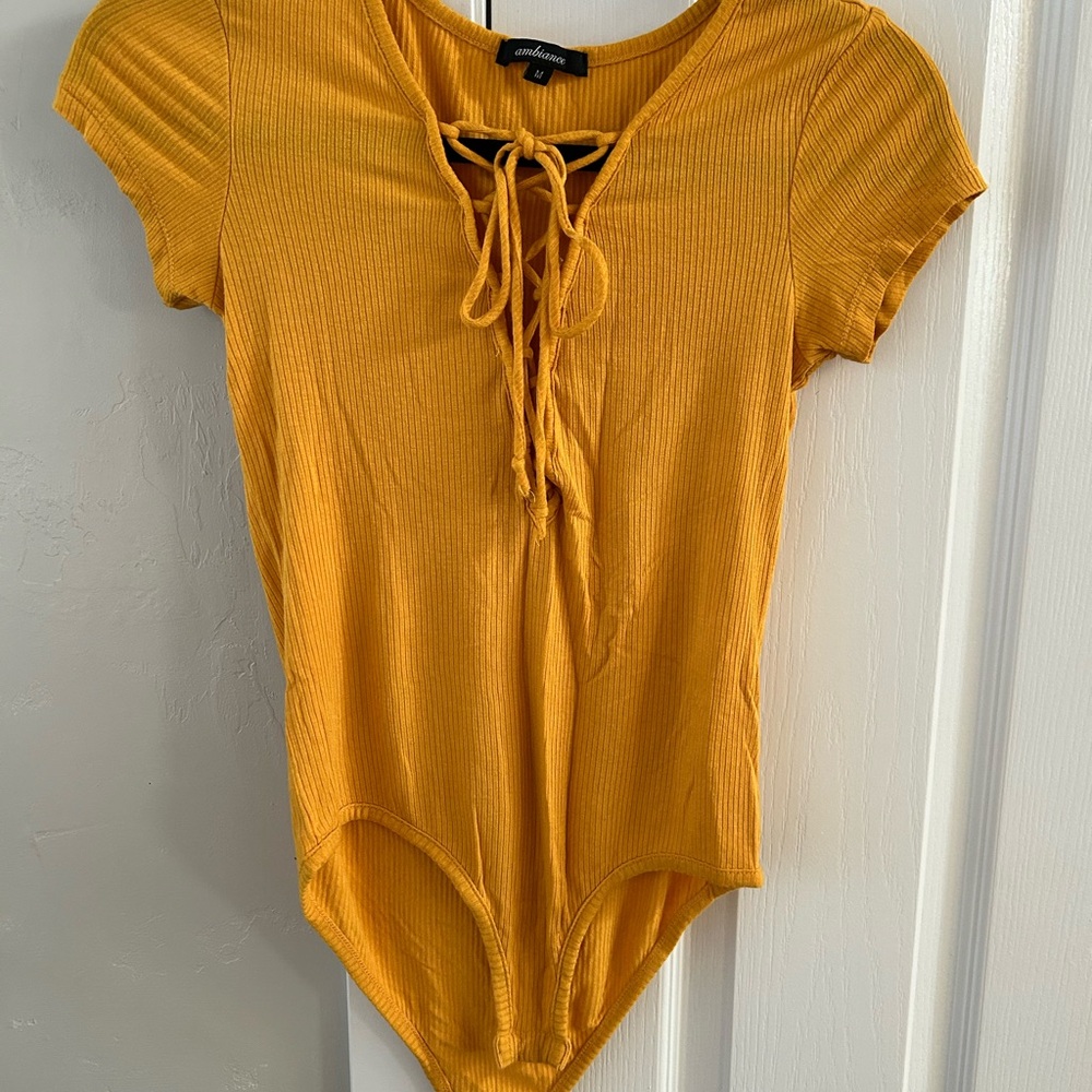 Ambiance Mustard Ribbed Bodysuit with Lace-Up Front